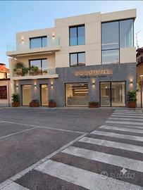 Locale Commerciale con Appartamenti
