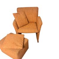 Poltroncina sfoderabile con pouf su rotelle