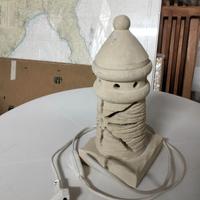 Lampada faro pietra