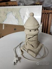 Lampada faro pietra