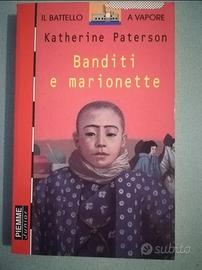 IL BATTELLO A VAPORE
BANDITI E MARIONETTE
Paterson