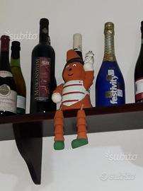 Bambolina di Creta pendente per mensole