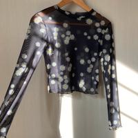 Top Bershka trasparente a fiorellini