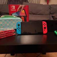 Nintendo Switch OLED + 2 joycon+ custodia + giochi