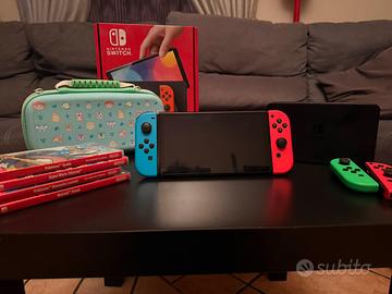 Nintendo Switch OLED + 2 joycon+ custodia + giochi