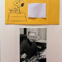 Foto autografa e busta originale di Charles Schulz