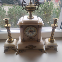 Orologio con candelieri