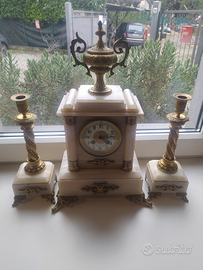 Orologio con candelieri