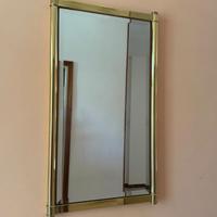 Carrello tv, specchiera da ingresso e quadro.