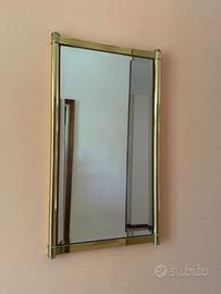 Carrello tv, specchiera da ingresso e quadro.