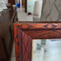 specchio con cornice in legno
