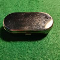 porta pillole in metallo