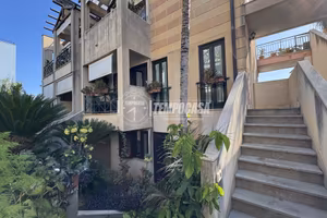 APPARTAMENTO CON GIARDINO PRIVATO E POSTO AUTO