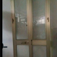 Porta a due ante in alluminio