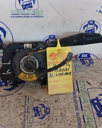 DEVIA LUCI LANCIA Y COMANDI AL VOLANTE