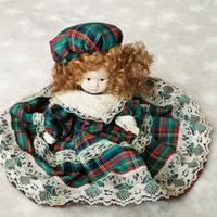 Bambola da collezione in porcellana