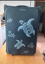 Valigia marca Carpisa.
