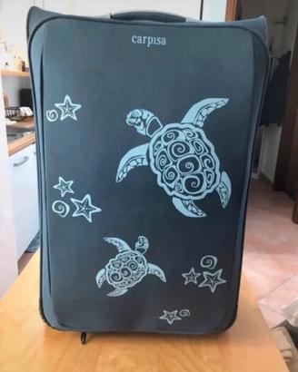 Valigia marca Carpisa.
