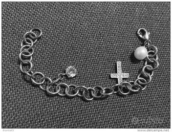 Braccialetto metallo con pendenti