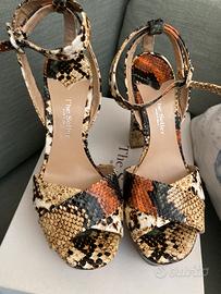 Sandali alti in pelle