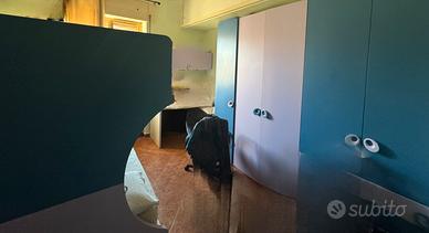 Cameretta bambini maschio femmina blu e lilla