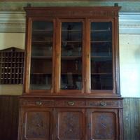 Libreria in legno intagliato inizio 1900.