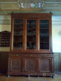 Libreria in legno intagliato inizio 1900.