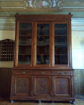Libreria in legno intagliato inizio 1900.