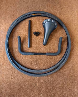 SELLA MANUBRIO COPERTONI ACCESSORI RICAMBI NUOVI