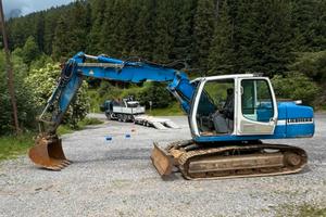 Liebherr R 317 triplice con lama