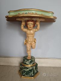 Antico Gueridon laccato con putto