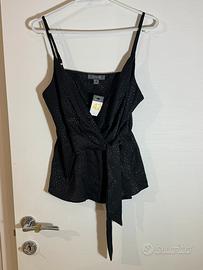 Maglia canottiera con fiocco nera elegante