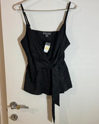 Maglia canottiera con fiocco nera elegante