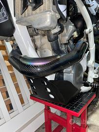 Protezione in carbonio per Husqvarna