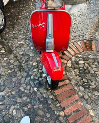 Vespa special 3 marce faro quadro