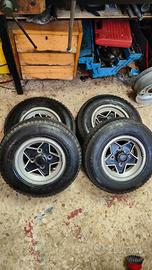 4 cerchi r10 con gomme 145 per mini Cooper d'epoca