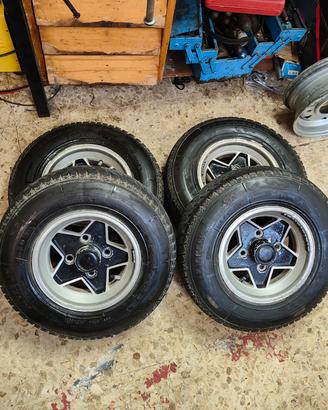 4 cerchi r10 con gomme 145 per mini Cooper d'epoca