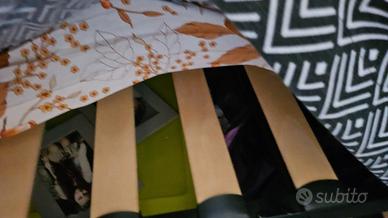 Letto singolo in metallo nero con seconda rete