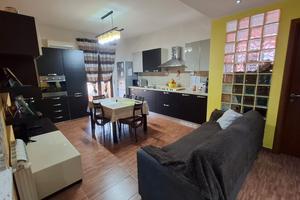 Tre vani ristrutturato in residence con posto auto