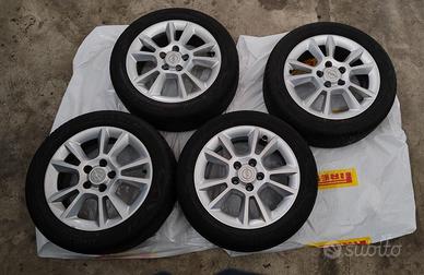 Set di 4 Cerchi in lega Opel + Gomme