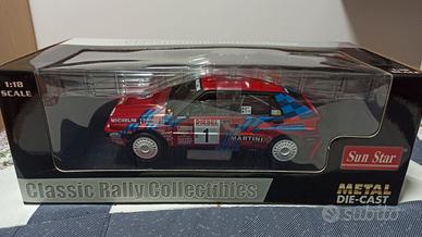 Sunstar Lancia Delta HF Sanremo 1989 1/18