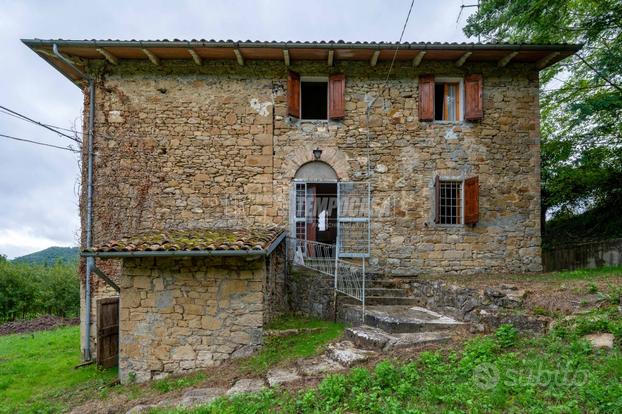 PORZIONE DI CASA CON TERRENO A ZOCCA