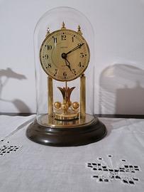 orologio da tavolo con campana in vetro