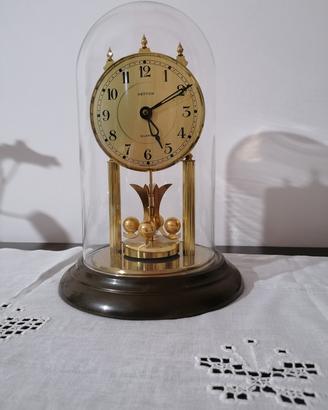 orologio da tavolo con campana in vetro