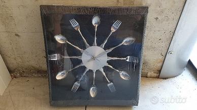 Orologio da parete con posate