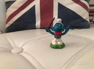 Puffo direttore d’orchestra con base verde smurfs