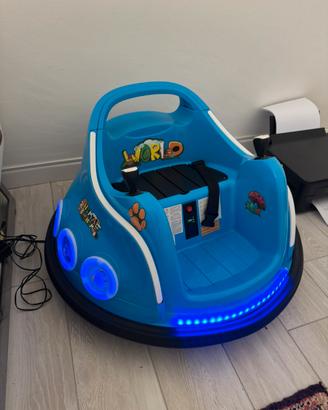 Macchina bambino blu luci e musica girevole