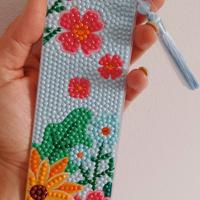 Segnalibro celeste con i fiori 