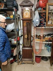 Antico orlogio pendolo meccanco