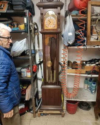 Antico orlogio pendolo meccanco